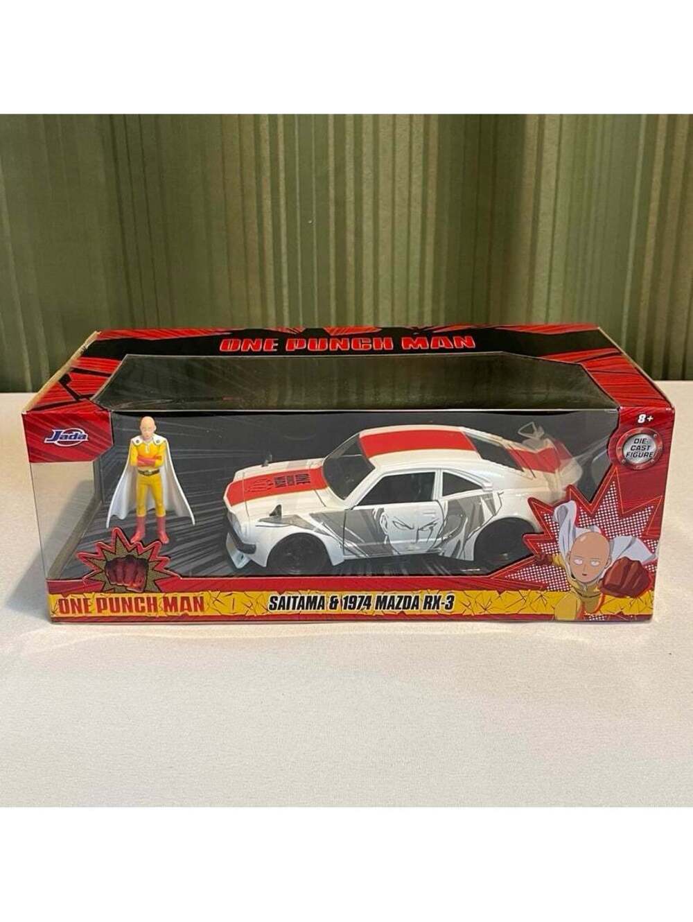 New- 1:24 Jada One Punch Man 1974 Mazda RX-3 Die-cast Car & 2.75" Saitama Figure
